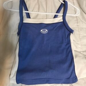 Vintage periwinkle blue Roxy tank with white stripes down sides.